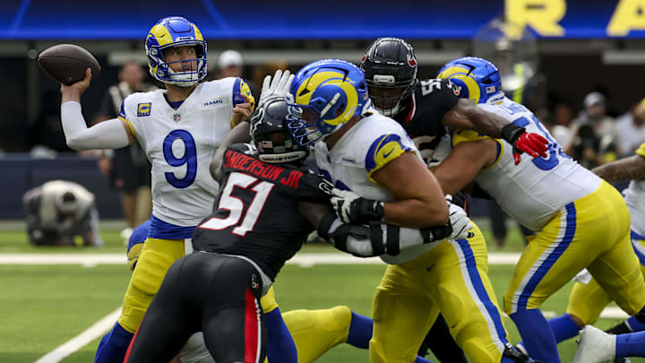 Sep 7, 2025; Inglewood, California, USA; Los Angeles Rams quarterback Matthew Stafford (9) looks to pass during the second quarter at SoFi Stadium. Mandatory Credit: Kiyoshi Mio-Imagn Images