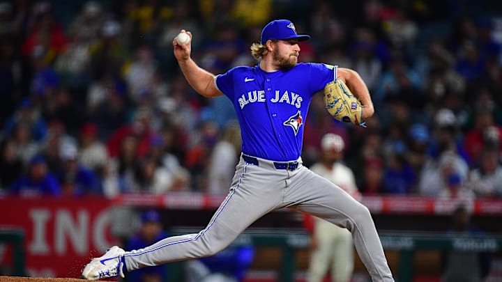 Apr 21, 2026; Anaheim, California, USA; Toronto Blue Jays pitcher Spencer Miles (62) throws against the Los Angeles Angels during the sixth inning at Angel Stadium. Mandatory Credit: Gary A. Vasquez-Imagn Images