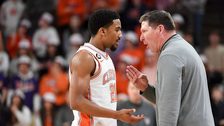 Clemson head coach Brad Brownell coaches guard Ace Buckner in the Tigers' loss to NC State at home on Tuesday night. 