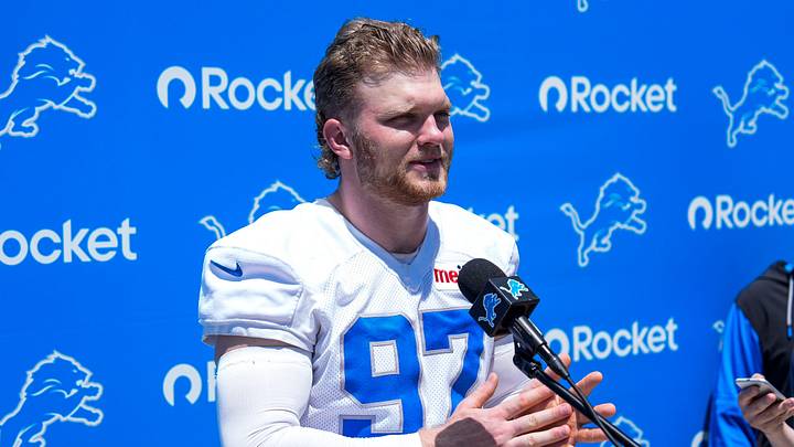 Detroit Lions defensive end Aidan Hutchinson (97) speaks to media after practice during OTAs at Meijer Performance Center in Allen Park on Friday, May 29, 2026.