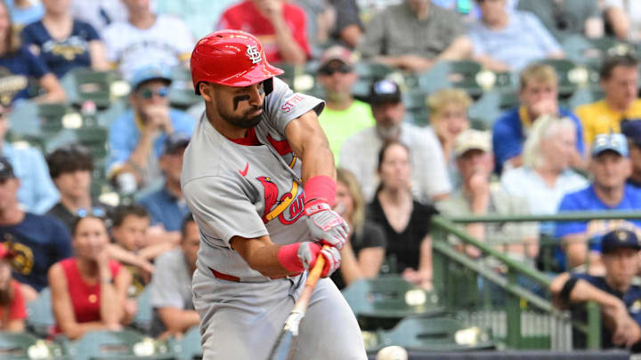 Sep 14, 2025; Milwaukee, Wisconsin, USA; St. Louis Cardinals second baseman Jose Fermin (15) drives in a run with a base hit against the Milwaukee Brewers in the second inning at American Family Field. Mandatory Credit: Benny Sieu-Imagn Images