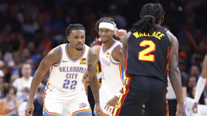 Oct 27, 2024; Oklahoma City, Oklahoma, USA; Oklahoma City Thunder guard Cason Wallace (22) defends Atlanta Hawks guard Keaton Wallace (2) during the second half at Paycom Center. Mandatory Credit: Alonzo Adams-Imagn Images