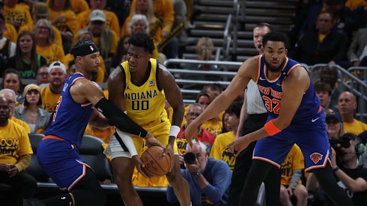May 25, 2025; Indianapolis, Indiana, USA; Indiana Pacers guard Bennedict Mathurin (00) drives to the hoop past New York Knicks guard Josh Hart (3) and center Karl-Anthony Towns (32) during the second quarter of game three of the eastern conference finals for the 2025 NBA Playoffs at Gainbridge Fieldhouse. Mandatory Credit: Trevor Ruszkowski-Imagn Images May 25, 2025; Indianapolis, Indiana, USA; Indiana Pacers guard Bennedict Mathurin (00) drives to the hoop past New York Knicks guard Josh Hart (3) and center Karl-Anthony Towns (32) during the second quarter of game three of the eastern conference finals for the 2025 NBA Playoffs at Gainbridge Fieldhouse. Mandatory Credit: Trevor Ruszkowski-Imagn Images