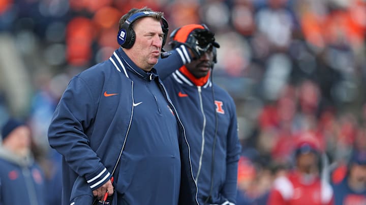 Nov 23, 2024; Piscataway, New Jersey, USA; Illinois Fighting Illini head coach Bret Bielema looks on during the second half against the Rutgers Scarlet Knights at SHI Stadium. Mandatory Credit: Vincent Carchietta-Imagn Images