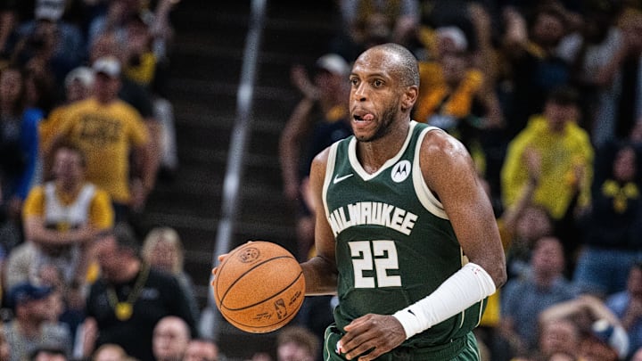 Apr 28, 2024; Indianapolis, Indiana, USA; Milwaukee Bucks forward Khris Middleton (22) dribbles the ball during game four of the first round for the 2024 NBA playoffs against the Indiana Pacers at Gainbridge Fieldhouse. Mandatory Credit: Trevor Ruszkowski-Imagn Images