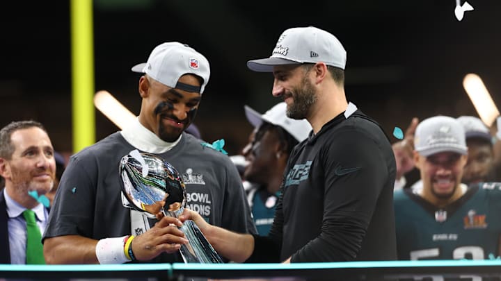 Feb 9, 2025; New Orleans, LA, USA; Philadelphia Eagles quarterback Jalen Hurts (1) and Philadelphia Eagles head coach Nick Sirianni celebrate with the Vince Lombardi Trophy after defeating the Kansas City Chiefs in Super Bowl LIX at Ceasars Superdome. Mandatory Credit: Mark J. Rebilas-Imagn Images