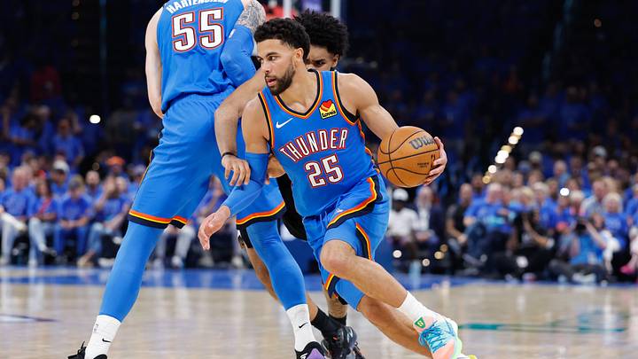 May 18, 2026; Oklahoma City, Oklahoma, USA; Oklahoma City Thunder guard Ajay Mitchell (25) drives the ball in the third quarter against the San Antonio Spurs during game one of the western conference finals for the 2026 NBA playoffs at Paycom Center. Mandatory Credit: Alonzo Adams-Imagn Images May 18, 2026; Oklahoma City, Oklahoma, USA; Oklahoma City Thunder guard Ajay Mitchell (25) drives the ball in the third quarter against the San Antonio Spurs during game one of the western conference finals for the 2026 NBA playoffs at Paycom Center. Mandatory Credit: Alonzo Adams-Imagn Images