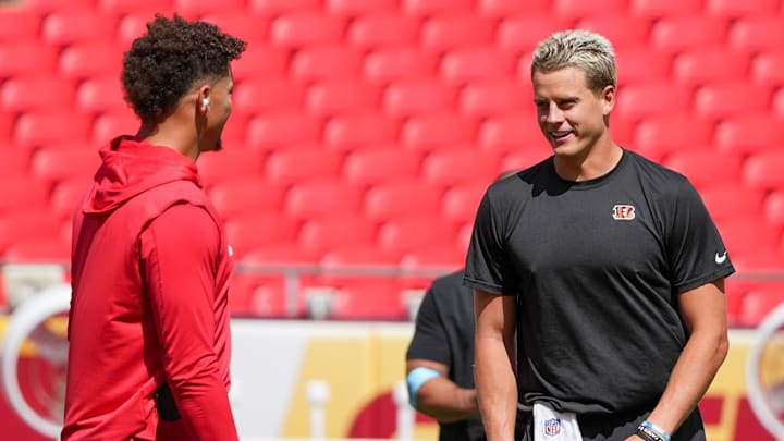 Sep 15, 2024; Kansas City, Missouri, USA; Kansas City Chiefs quarterback Patrick Mahomes (15) talks with Cincinnati Bengals quarterback Joe Burrow (9) on field prior to a game at GEHA Field at Arrowhead Stadium. Mandatory Credit: Denny Medley-Imagn Images