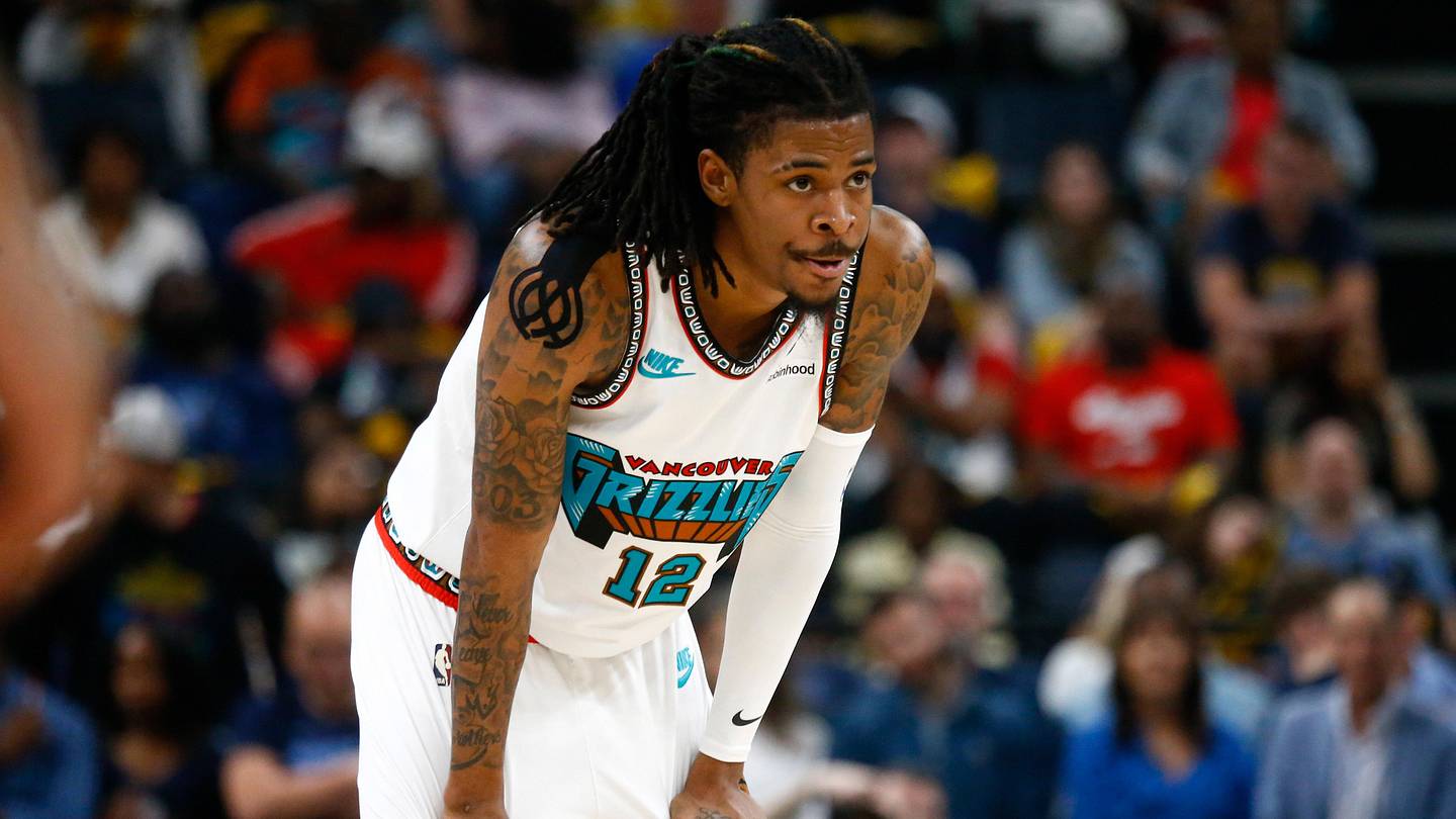 Computer screen showing Ja Morant stats and performance analysis on sports website now