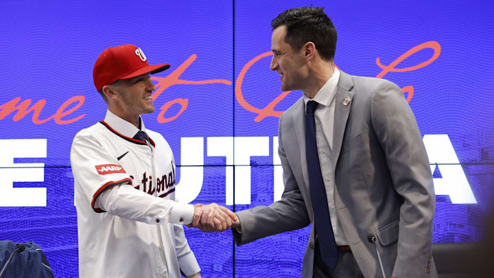 Nov 17, 2025; Washington, District of Columbia, USA;  Washington Nationals manager Blake Butera (L) shakes hands with Nationals general manager and president of baseball operations Paul Toboni (R) at an introductory press conference at Nationals Park. Mandatory Credit: Geoff Burke-Imagn Images