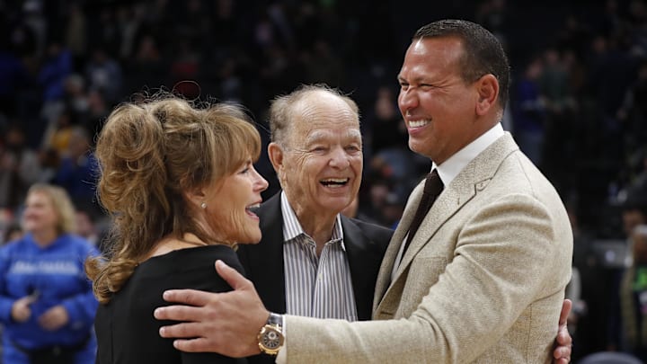 Feb 1, 2023; Minneapolis, Minnesota, USA; Current majority owner of the Minnesota Timberwolves Glen Taylor and his wife Becky Mulvihill greet minority owner Alex Rodriguez (right) after the team defeated the Golden State Warriors at Target Center. Mandatory Credit: Bruce Kluckhohn-Imagn Images
