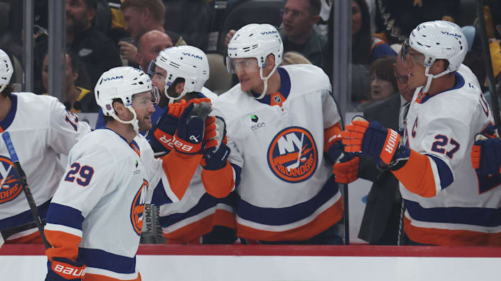 Oct 9, 2025; Pittsburgh, Pennsylvania, USA;  New York Islanders left wing Jonathan Drouin (29) celebrates his goal with teammates against the Pittsburgh Penguins during the first period at PPG Paints Arena. Mandatory Credit: Charles LeClaire-Imagn Images
