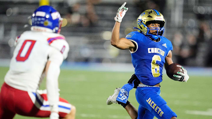 Choctaw's JuJu Smith rushes as Bixby's Emory Snyder defends during the high school football game between Choctaw and Bixby at Choctaw High School in Choctaw, Okla.. Friday, Sept., 20, 2024.