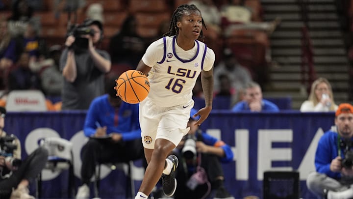 Mar 7, 2025; Greenville, SC, USA; LSU Lady Tigers guard Kailyn Gilbert (16) brings the ball up court against the Florida Gators during the second half at Bon Secours Wellness Arena. Mandatory Credit: Jim Dedmon-Imagn Images