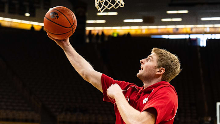 Steven Crowl (22) warms up before the Iowa game. Mandatory Credit: Dylan Widger-Imagn Images
