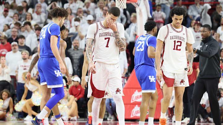 Jan 31, 2026; Fayetteville, Arkansas, USA; Arkansas Razorbacks forwards Trevon Brazile (7) and Malique Ewin (12) reacts after a call during the second half against the Kentucky Wildcats at Bud Walton Arena. Kentucky won 85-77. Mandatory Credit: Nelson Chenault-Imagn Images
