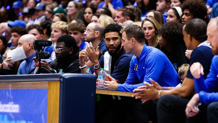 Oct 3, 2025; Durham, NC, USA;  Jayson Tatum, NBA Boston Celtics Player helps coach alongside Duke Blue Devils head coach Jon Scheyer during the Countdown to Craziness at the Cameron Indoor Stadium. Mandatory Credit: Jaylynn Nash-Imagn Images