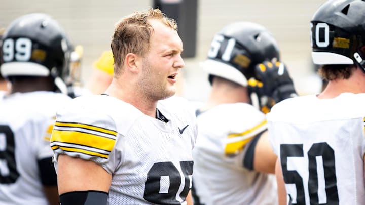 Aug 9, 2025; Iowa defensive lineman Aaron Graves (95) stands on the sideline during the Hawkeyes Kids Day NCAA football open practice at Kinnick Stadium in Iowa City, Iowa. Mandatory Credit: Joseph Cress for the Des Moines Register