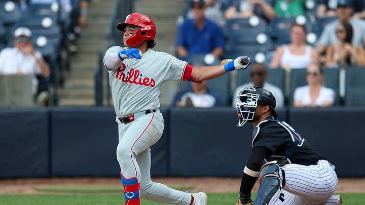 Mar 14, 2026; Tampa, Florida, USA; Philadelphia Phillies third baseman Christian Cairo (70) singles against the New York Yankees in the third inning during spring training at George M. Steinbrenner Field. Mandatory Credit: Nathan Ray Seebeck-Imagn Images Mar 14, 2026; Tampa, Florida, USA; Philadelphia Phillies third baseman Christian Cairo (70) singles against the New York Yankees in the third inning during spring training at George M. Steinbrenner Field. Mandatory Credit: Nathan Ray Seebeck-Imagn Images