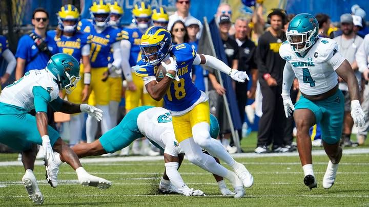 Delaware’s Sean Wilson takes a reception downfield in the Blue Hens’ 22-14 win against Coastal Carolina at Delaware Stadium on Sept. 19, 2026. Delaware’s Sean Wilson takes a reception downfield in the Blue Hens’ 22-14 win against Coastal Carolina at Delaware Stadium on Sept. 19, 2026.