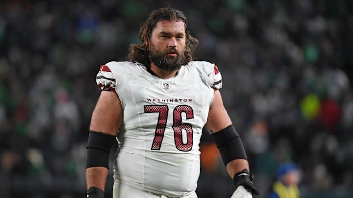 Nov 14, 2024; Philadelphia, Pennsylvania, USA; Washington Commanders guard Sam Cosmi (76) against the Philadelphia Eagles at Lincoln Financial Field. Mandatory Credit: Eric Hartline-Imagn Images