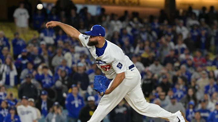 Mar 31, 2025; Los Angeles, California, USA;  Los Angeles Dodgers relief pitcher Luis Garcia (57) delivers to the plate in the ninth inning against the Atlanta Braves at Dodger Stadium. Mandatory Credit: Jayne Kamin-Oncea-Imagn Images