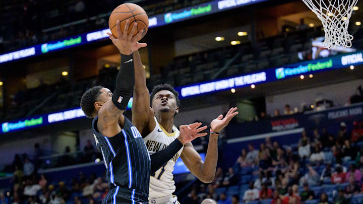 New Orleans Pelicans center Yves Missi (21) blocks the shot of Orlando Magic guard Gary Harris (14) during the first half at Smoothie King Center. 