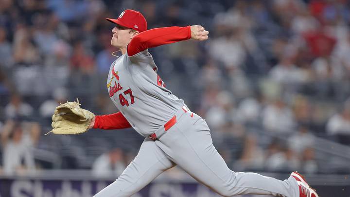 Aug 5, 2026; Bronx, New York, USA; St. Louis Cardinals relief pitcher Justin Bruihl (47) slips on a wet pitchers mound as he pitches against the New York Yankees during the seventh inning at Yankee Stadium. Mandatory Credit: Brad Penner-Imagn Images