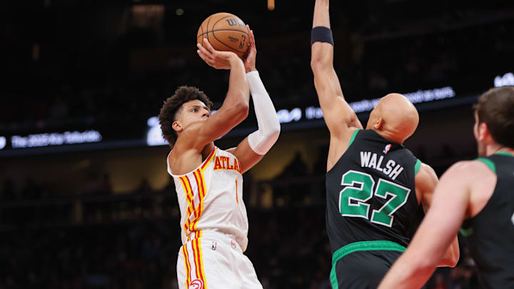 Nov 4, 2024; Atlanta, Georgia, USA; Atlanta Hawks forward Jalen Johnson (1) shoots over Boston Celtics guard Jordan Walsh (27) in the fourth quarter at State Farm Arena. Mandatory Credit: Brett Davis-Imagn Images
Nov 4, 2024; Atlanta, Georgia, USA; Atlanta Hawks forward Jalen Johnson (1) shoots over Boston Celtics guard Jordan Walsh (27) in the fourth quarter at State Farm Arena. Mandatory Credit: Brett Davis-Imagn Images