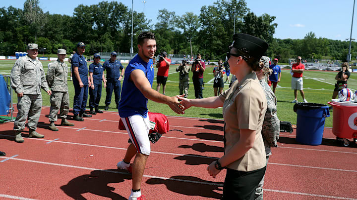 Bills quarterback Josh Allen shakes hands with military personal on Military Appreciation Day at Buffalo Bills training camp.