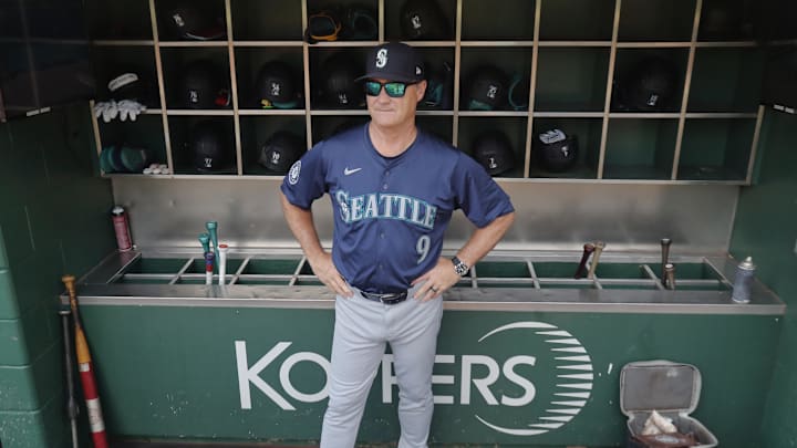 Seattle Mariners manager Scott Servais (9) looks on from the dugout before the game against the Pittsburgh Pirates at PNC Park in 2024.