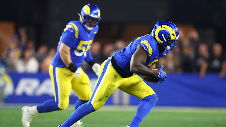 Jan 13, 2025; Glendale, AZ, USA; Los Angeles Rams linebacker Jared Verse (8) recovers a fumble against the Minnesota Vikings during the first half in an NFC wild card game at State Farm Stadium. Mandatory Credit: Mark J. Rebilas-Imagn Images