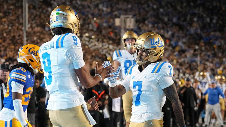 Sep 5, 2026; Berkeley, California, USA; UCLA Bruins quarterback Nico Iamaleava (9) celebrates with wide receiver Mikey Matthews (7) after scoring a touchdown against the California Golden Bears during the first quarter at California Memorial Stadium. Sep 5, 2026; Berkeley, California, USA; UCLA Bruins quarterback Nico Iamaleava (9) celebrates with wide receiver Mikey Matthews (7) after scoring a touchdown against the California Golden Bears during the first quarter at California Memorial Stadium.