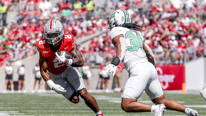 Sep 21, 2024; Columbus, Ohio, USA; Ohio State Buckeyes wide receiver Emeka Egbuka (2) runs the ball during the second quarter against the Marshall Thundering Herd at Ohio Stadium. Mandatory Credit: Joseph Maiorana-Imagn Images