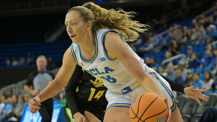 Dec 7, 2025; Los Angeles, California, USA; UCLA Bruins guard Gianna Kneepkens (8) drives past Oregon Ducks guard Ari Long (14) during the first half at Pauley Pavilion presented by Wescom Financial. Mandatory Credit: Jayne Kamin-Oncea-Imagn Images Dec 7, 2025; Los Angeles, California, USA; UCLA Bruins guard Gianna Kneepkens (8) drives past Oregon Ducks guard Ari Long (14) during the first half at Pauley Pavilion presented by Wescom Financial. Mandatory Credit: Jayne Kamin-Oncea-Imagn Images