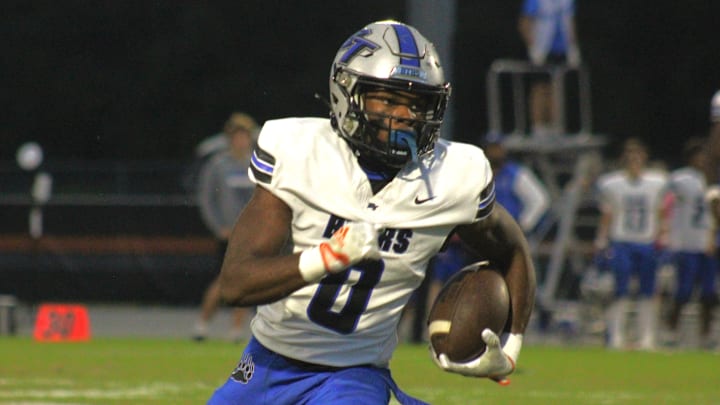 Bartram Trail running back Arthur Lewis IV (0) rushes for yardage against Tocoi Creek during a high school football game on September 25, 2024. [Clayton Freeman/Florida Times-Union]