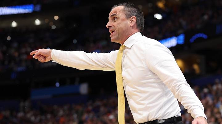 Mar 22, 2026; Tampa, FL, USA; Iowa Hawkeyes head coach Ben McCollum instructs his team against the Florida Gators in the first half during a second round game of the men's 2026 NCAA Tournament at Benchmark International Arena. Mandatory Credit: Nathan Ray Seebeck-Imagn Images