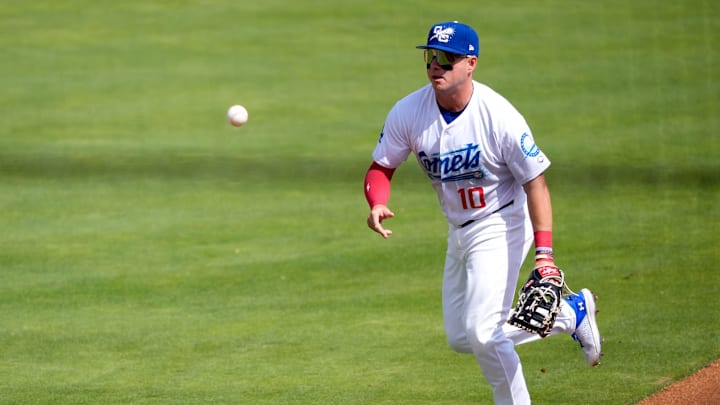 Oklahoma City's Ryan Ward (10) throws to first for an out during the minor league baseball between the Oklahoma City Comets and the Tacoma Rainers a the Chickasaw Bricktown Ballpark in Oklahoma City, Wednesday, April, 16, 2025. Oklahoma City's Ryan Ward (10) throws to first for an out during the minor league baseball between the Oklahoma City Comets and the Tacoma Rainers a the Chickasaw Bricktown Ballpark in Oklahoma City, Wednesday, April, 16, 2025.