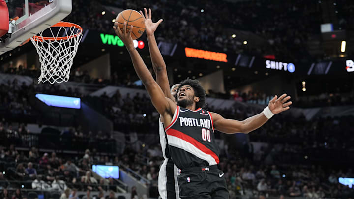 Nov 7, 2024; San Antonio, Texas, USA;  Portland Trail Blazers guard Scoot Henderson (00) shoots in the second half against the San Antonio Spurs at Frost Bank Center. Mandatory Credit: Daniel Dunn-Imagn Images