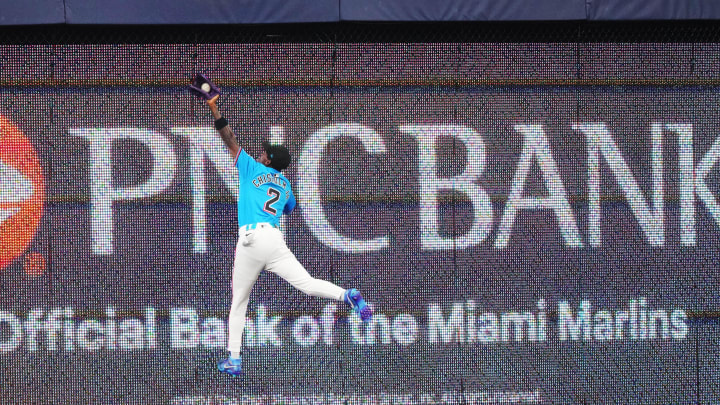 Jul 7, 2024; Miami, Florida, USA;  Miami Marlins center fielder Jazz Chisholm Jr. (2) makes a leaping catch in the first inning against the Chicago White Sox at loanDepot Park. Mandatory Credit: Jim Rassol-USA TODAY Sports