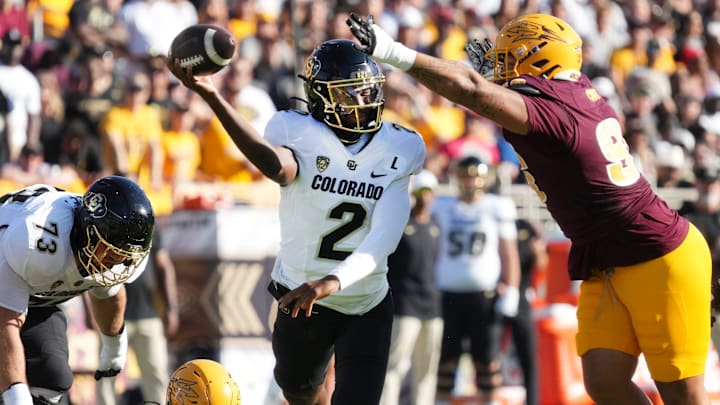 ASU Sun Devils defensive lineman Anthonie Cooper (96) tries to block the pass of Colorado Buffaloes quarterback Shedeur Sanders (2) at Mountain America Stadium on Oct 7, 2023.