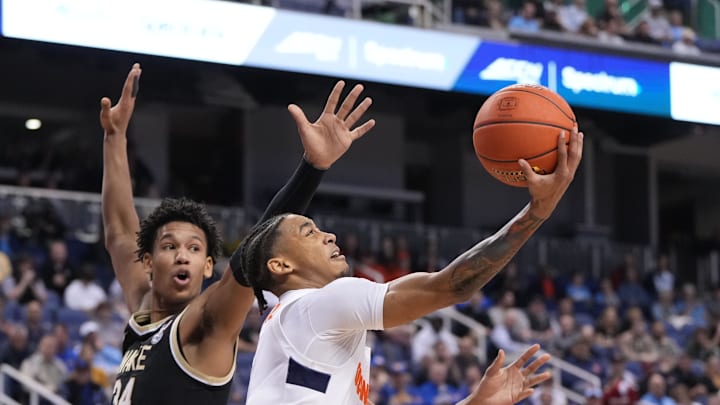 Syracuse basketball first plays in the ACC Tournament this Wednesday night. Experts pick the event's winner and a sleeper.