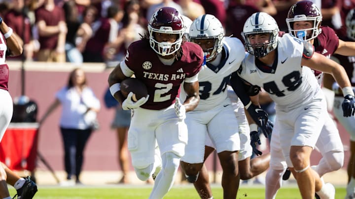 Texas A&M Aggies wide receiver Terry Bussey (2) runs with the ball in the first half.