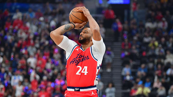 Apr 4, 2025; Inglewood, California, USA;  Los Angeles Clippers guard Norman Powell (24) shoots against the against the Dallas Mavericks during the first half at Intuit Dome. Mandatory Credit: Gary A. Vasquez-Imagn Images