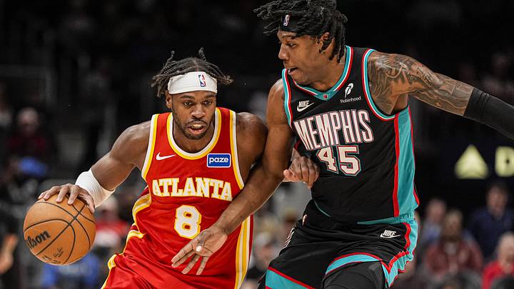 Mar 23, 2026; Atlanta, Georgia, USA; Atlanta Hawks guard Buddy Hield (8) dribbles against Memphis Grizzlies forward GG Jackson (45) during the second half at State Farm Arena. Mandatory Credit: Dale Zanine-Imagn Images