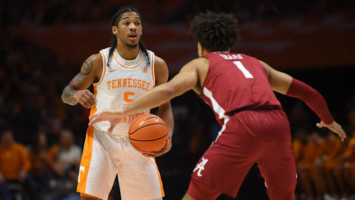 Tennessee guard Zakai Zeigler (5) dribbles down the court with Alabama guard Mark Sears (1) defending during the NCAA game at Thompson-Boling Arena at Food City Center, Saturday, Jan. 20, 2024. Tennessee guard Zakai Zeigler (5) dribbles down the court with Alabama guard Mark Sears (1) defending during the NCAA game at Thompson-Boling Arena at Food City Center, Saturday, Jan. 20, 2024.