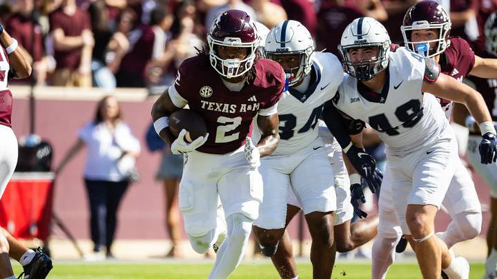 Nov 22, 2025; College Station, Texas, USA; Texas A&M Aggies wide receiver Terry Bussey (2) runs with the ball in the first half of a game against the Samford Bulldogs at Kyle Field. Mandatory Credit: Joseph Buvid-Imagn Images Nov 22, 2025; College Station, Texas, USA; Texas A&M Aggies wide receiver Terry Bussey (2) runs with the ball in the first half of a game against the Samford Bulldogs at Kyle Field. Mandatory Credit: Joseph Buvid-Imagn Images