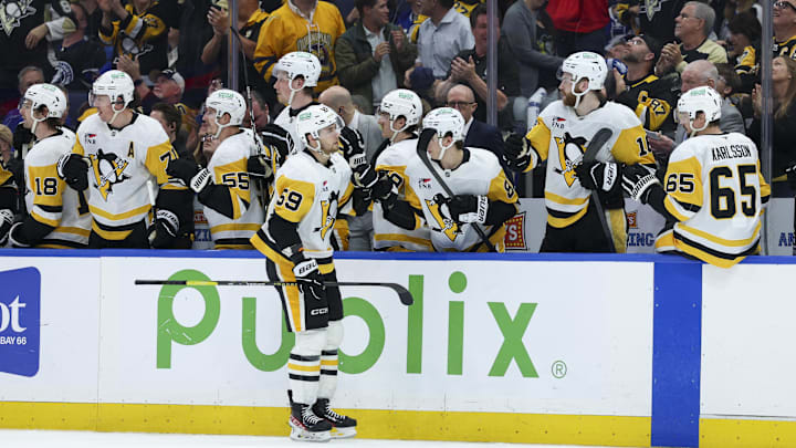 Apr 2, 2026; Tampa, Florida, USA; Pittsburgh Penguins right wing Egor Chinakhov (59) reacts after scoring a goal against the Tampa Bay Lightning in the first period at Benchmark International Arena. Mandatory Credit: Nathan Ray Seebeck-Imagn Images Apr 2, 2026; Tampa, Florida, USA; Pittsburgh Penguins right wing Egor Chinakhov (59) reacts after scoring a goal against the Tampa Bay Lightning in the first period at Benchmark International Arena. Mandatory Credit: Nathan Ray Seebeck-Imagn Images