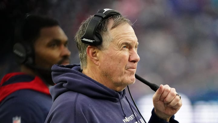 Jan 2, 2022; Foxborough, Massachusetts, USA; New England Patriots head coach Bill Belichick watches from the sideline as they take on the Jacksonville Jaguars in the second half at Gillette Stadium. Mandatory Credit: David Butler II-Imagn Images