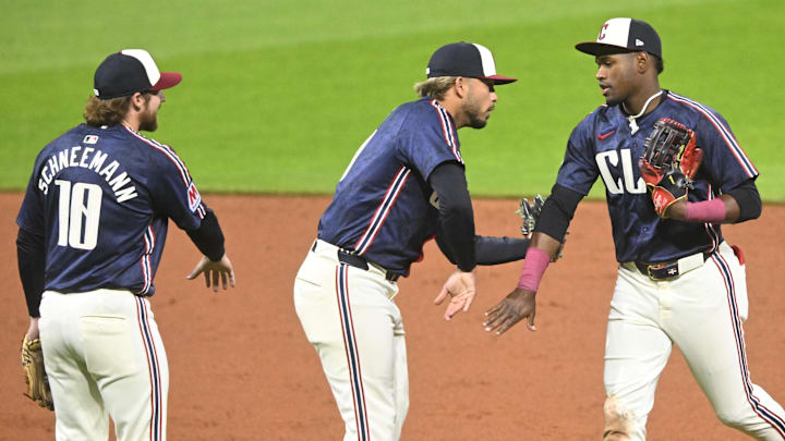 May 9, 2025; Cleveland, Ohio, USA; Cleveland Guardians second baseman Daniel Schneemann (10), shortstop Gabriel Arias (13) and center fielder Angel Martinez (1) celebrate a win over the Philadelphia Phillies at Progressive Field. Mandatory Credit: David Richard-Imagn Images